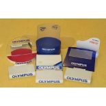 Group of Olympus Point-of-Sale Advertising Display Stands.
