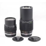 A Pair of Olympus M-System "Silver Nose" Telephoto Lenses.