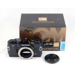 A Boxed, Black Olympus OM2-MD Film Camera.