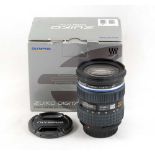An Olympus Zuiko Digital 12-60mm f2.8-4 4/3rds SWD Zoom Lens.
