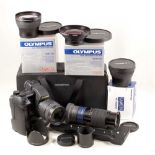 Extensive Olympus E-20P Digital Outfit.