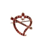 A garnet heart and arrow brooch, circa 1820