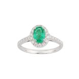 An emerald and diamond ring, 1997