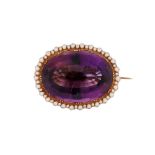 An amethyst and seed pearl brooch, circa 1900