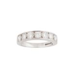 A diamond half-hoop ring