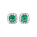 A pair of emerald and diamond earstuds