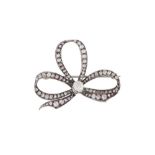 A diamond ribbon bow brooch, late 19th century