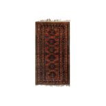 A FINE ANTIQUE BALOUCH RUG, NORTH-EAST PERSIA