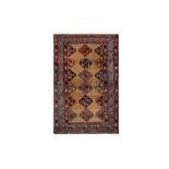 AN ANTIQUE WEST PERSIAN RUG