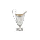 A George III Irish provincial silver milk jug, Cork circa 1785 by John Hillery (1750-1780) or John H