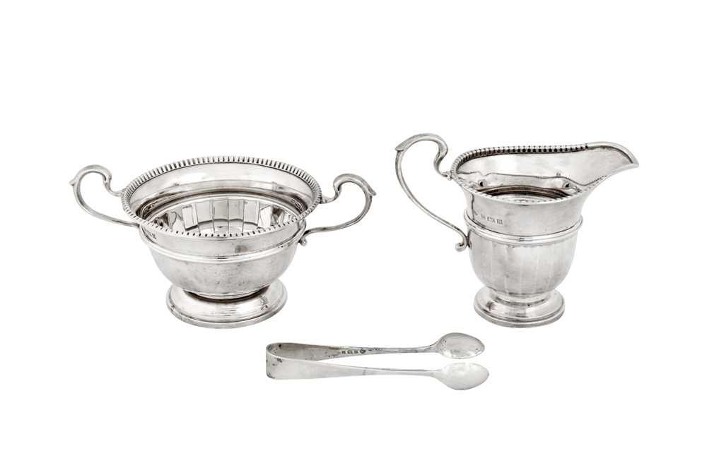 A cased Elizabeth II sterling silver three-piece tea service, Birmingham 1954 by Adie Brothers - Image 4 of 6