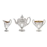 A Victorian sterling silver three-piece tea service, London 1871/74 by Martin Hall and Co