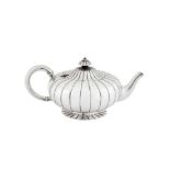 A Victorian sterling silver teapot, London 1857 by John Samuel Hunt