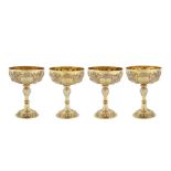 Horseracing interest – A set of four Victorian sterling silver gilt dessert bowls or cups, London 18