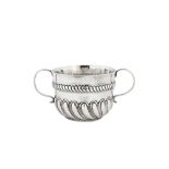 A William and Mary sterling silver twin handled caudle cup, London 1691 by I.N in an oval