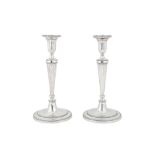 A pair of Victorian sterling silver candlesticks, London 1880 by Martin Hall and Co