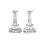 A pair of Victorian sterling silver candlesticks, London 1875 by John Henry Williamson