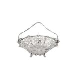A George III sterling silver epergne basket, London circa 1770 by Thomas Pitts