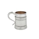 A George V Britannia standard silver pint mug, London 1928 by Charles Stuart Harris