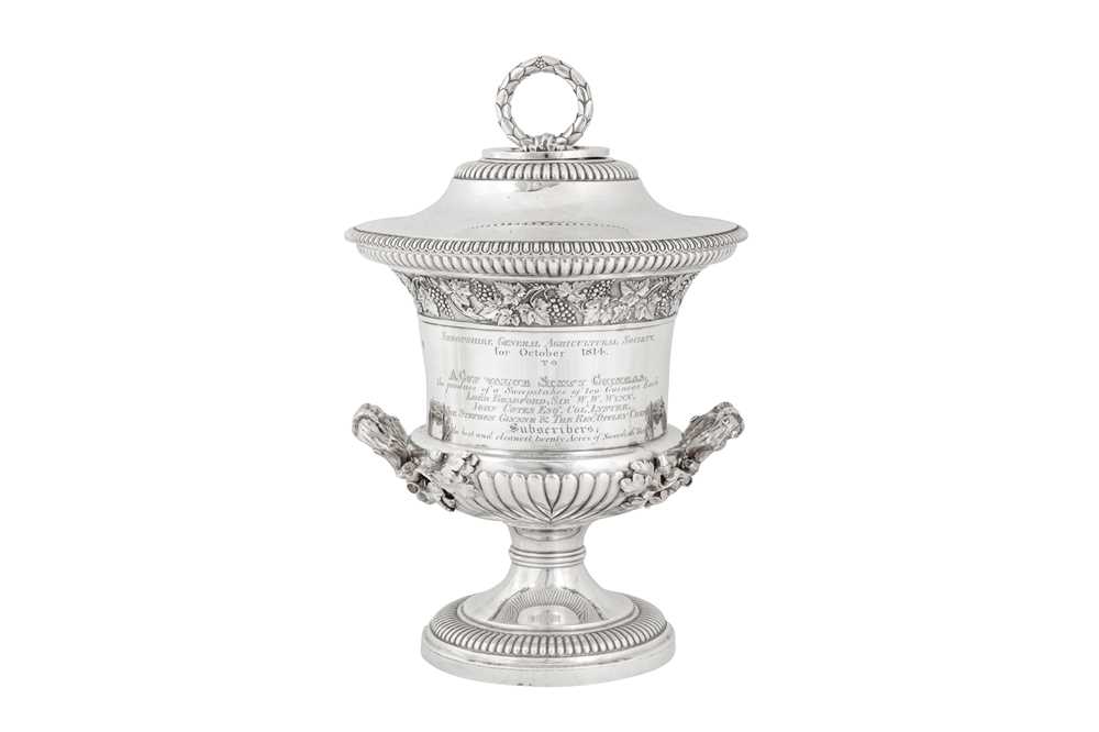Salop and Welsh interest - A George III sterling silver twin handled cup and cover, London 1814 by P