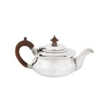 An Edwardian sterling silver bachelor teapot, London 1908 by Holland, Aldwinckle & Slater