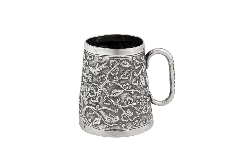 An early 20th century Anglo – Indian unmarked silver mug, Bombay circa 1920