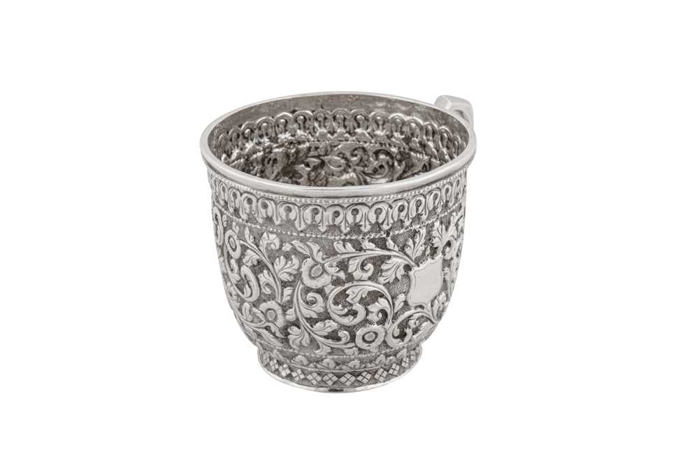 A late 19th / early 20th century Anglo – Indian silver christening mug or cup, Cutch circa 1900, mar - Image 2 of 4