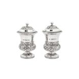 A pair of George IV sterling silver pepper casters, London 1824 by Thomas Wilkes Barker