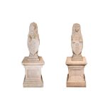 A PAIR OF COMPOSITION STONE GATE POST FINIALS
