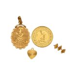 A GROUP OF GOLD ITEMS