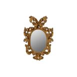 A SMALL CARVED GILTWOOD MIRROR, 18TH CENTURY