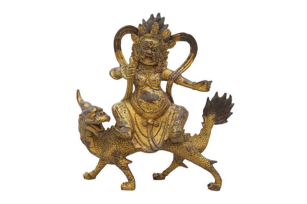 A TIBETAN GILT-BRONZE FIGURE OF A DEITY, 20TH CENTURY