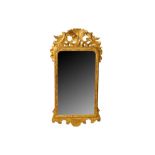 A GEORGE II GILTWOOD PIER MIRROR