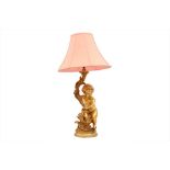 A GILT FIGURAL TABLE LAMP