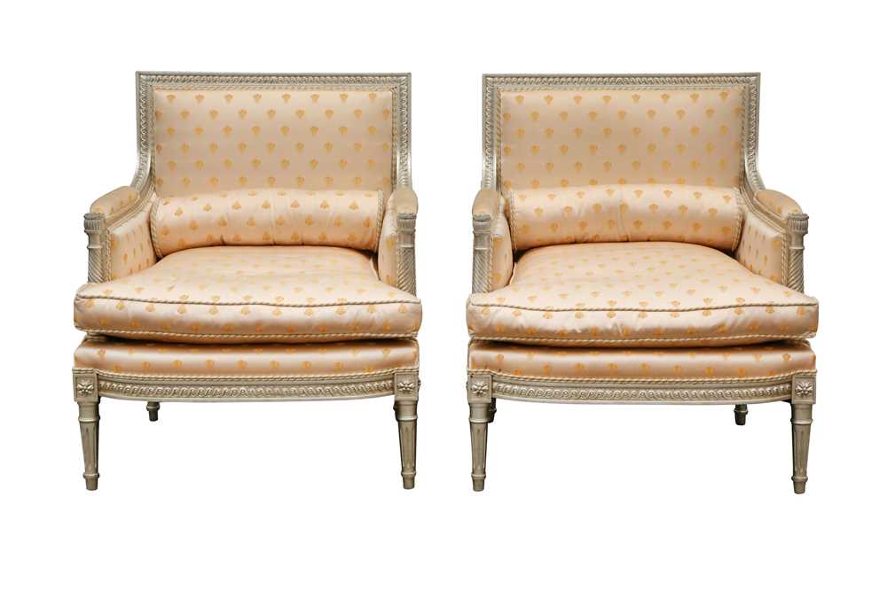 A PAIR OF LOUIS XVI STYLE SILVERED WOOD BERGERE ARMCHAIRS, LATE 20TH CENTURY