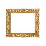 AN ITALIAN FLORENTINE 19TH CENTURY CARVED, PIERCED AND GILDED FRAME