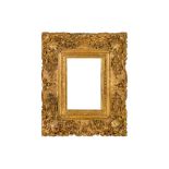 A 19TH CENTURY CHINA TRADE, LOUIS XV STYLE CARVED, PIERCED, SWEPT AND GILDED FRAME