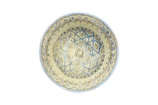 A KASHAN COBALT BLUE AND BLACK-PAINTED POTTERY BOWL WITH SIX-POINTED STAR DESIGN Kashan, Iran, late