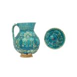 A BAMIYAN MOULDED AND TURQUOISE-GLAZED POTTERY JUG AND A SMALL BOWL Possibly Afghanistan, Eastern Ir