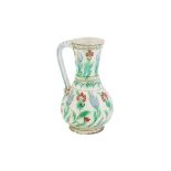 AN IZNIK POTTERY JUG Ottoman Turkey, ca. 1580 - 1600