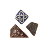 THREE MEDIEVAL IRANIAN POTTERY TILES Iran, 12th and 14th centuries