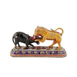 AN INDIAN POLYCHROME-ENAMELLED AND GEM-SET GOLD ANIMAL FIGURINE Jaipur, Rajasthan, North-Western Ind