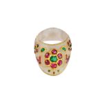 A RUBY AND EMERALD KUNDAN-SET CARVED WHITE JADE MUGHAL THUMB RING Mughal Northern India, 18th centur