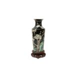 A CHINESE FAMILLE-NOIRE 'PRUNUS' VASE 清康熙 墨地五彩梅花紋瓶