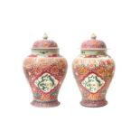 A PAIR OF CHINESE FAMILLE-ROSE 'DRAGON AND PHOENIX' VASES AND COVERS 清十九世紀 粉彩龍鳳呈祥圖紋瓶將軍罐一對 《大清康熙年製》款