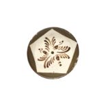 A CHINESE CIZHOU BROWN-GLAZED AND PAINTED DISH 元或明 磁州窰褐釉繪花盤
