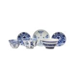 A GROUP OF THREE CHINESE BLUE AND WHITE CUPS AND THREE SMALL DISHES 清十八至十九世紀 青花盃及小盤各三件