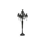 A CONTEMPORARY BLACK LACQUERED METAL FLOOR STANDING CANDELABRUM