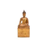 A LATE 19TH CENTURY THAI CARVED AND GILT WOOD BUDDHA