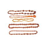 A COLLECTION OF AMBER NECKLACES